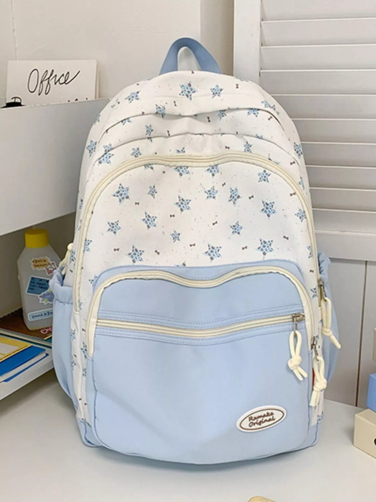 blue star print nylon backpack back view