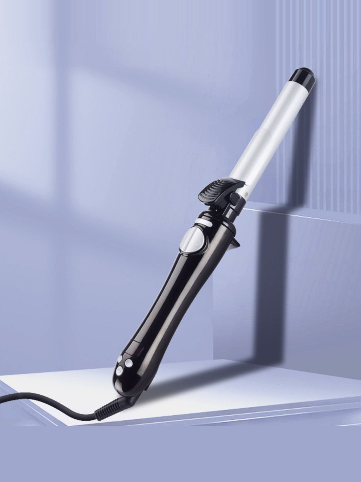 Curling iron held in hand