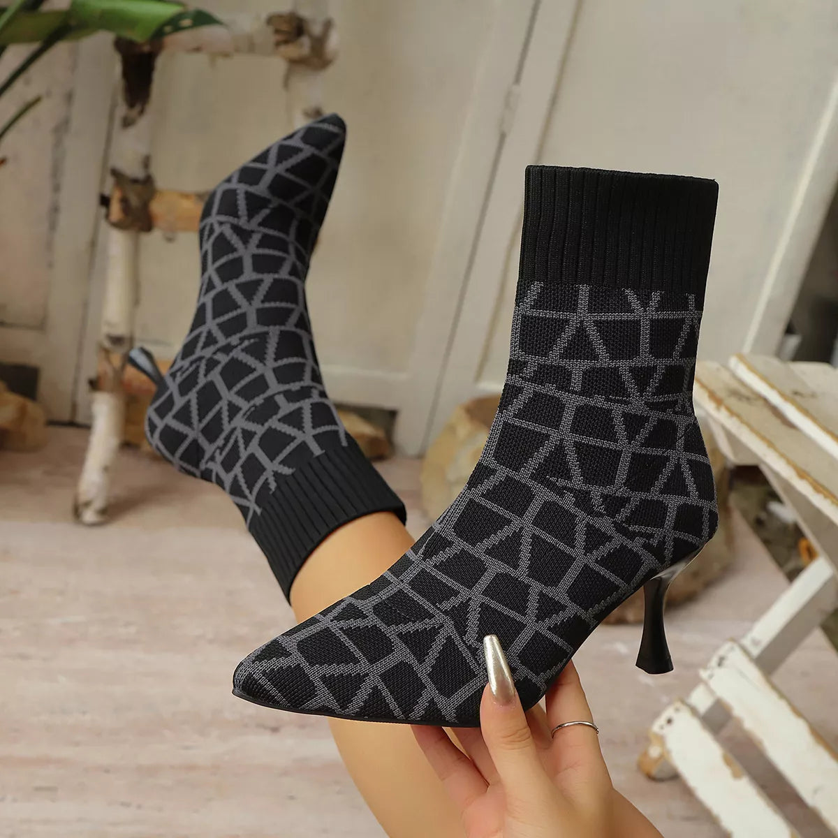 Off White point toe flared heel boots back heel view