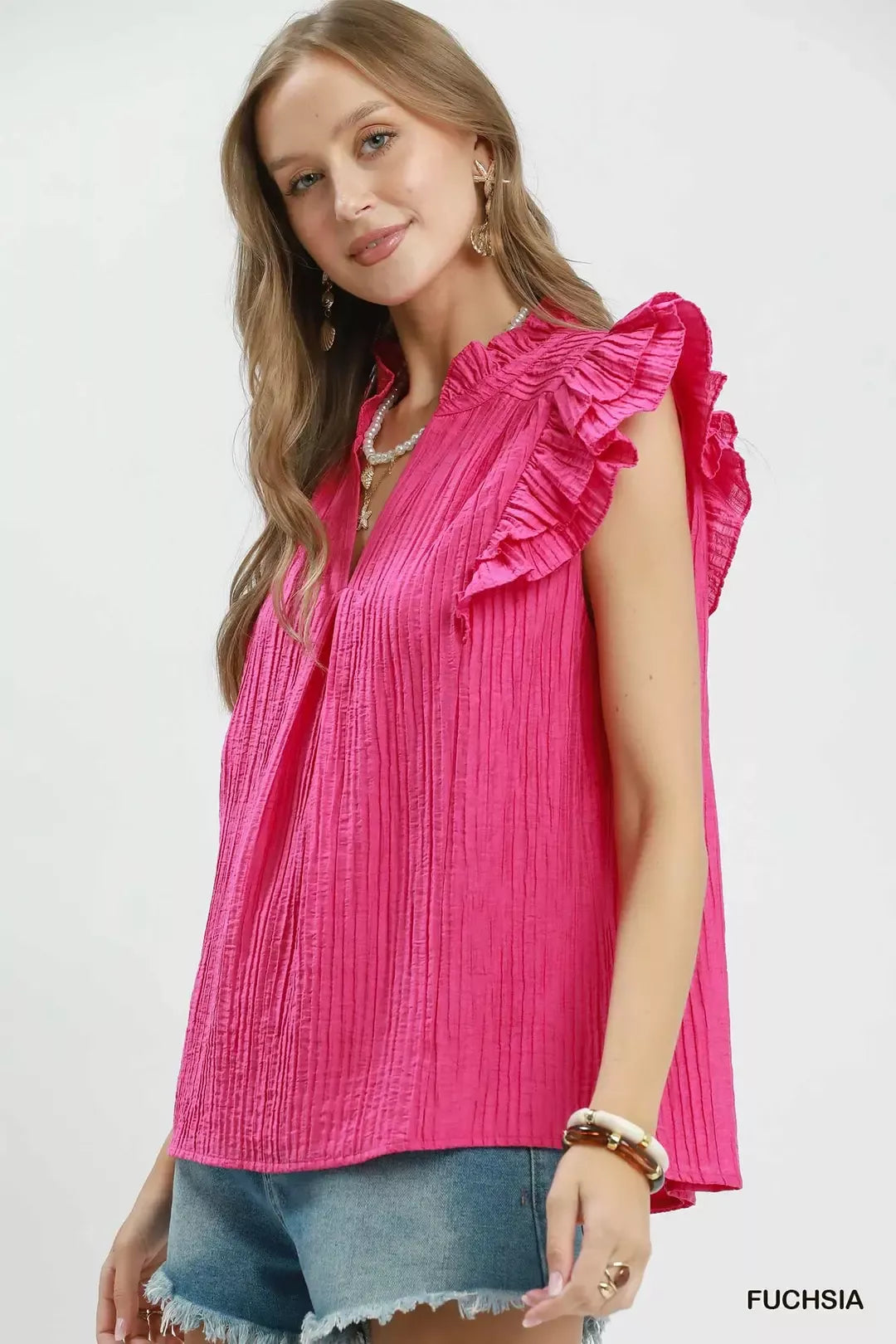 Umgee ruffle sleeve split V neck top in fuchsia back view