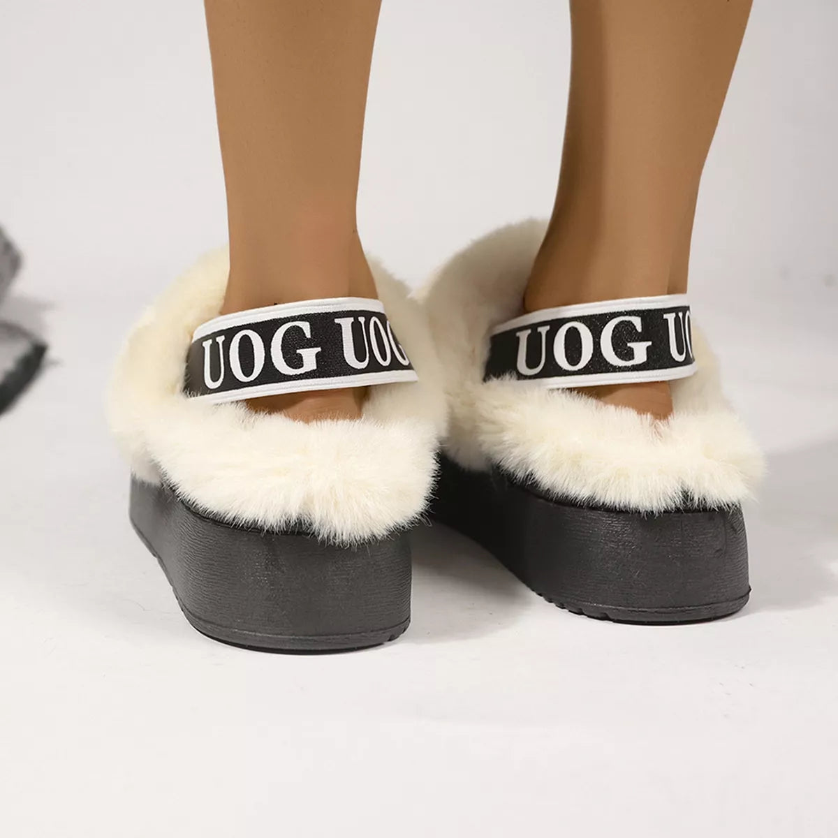 Round toe platform ankle boots in suede front view