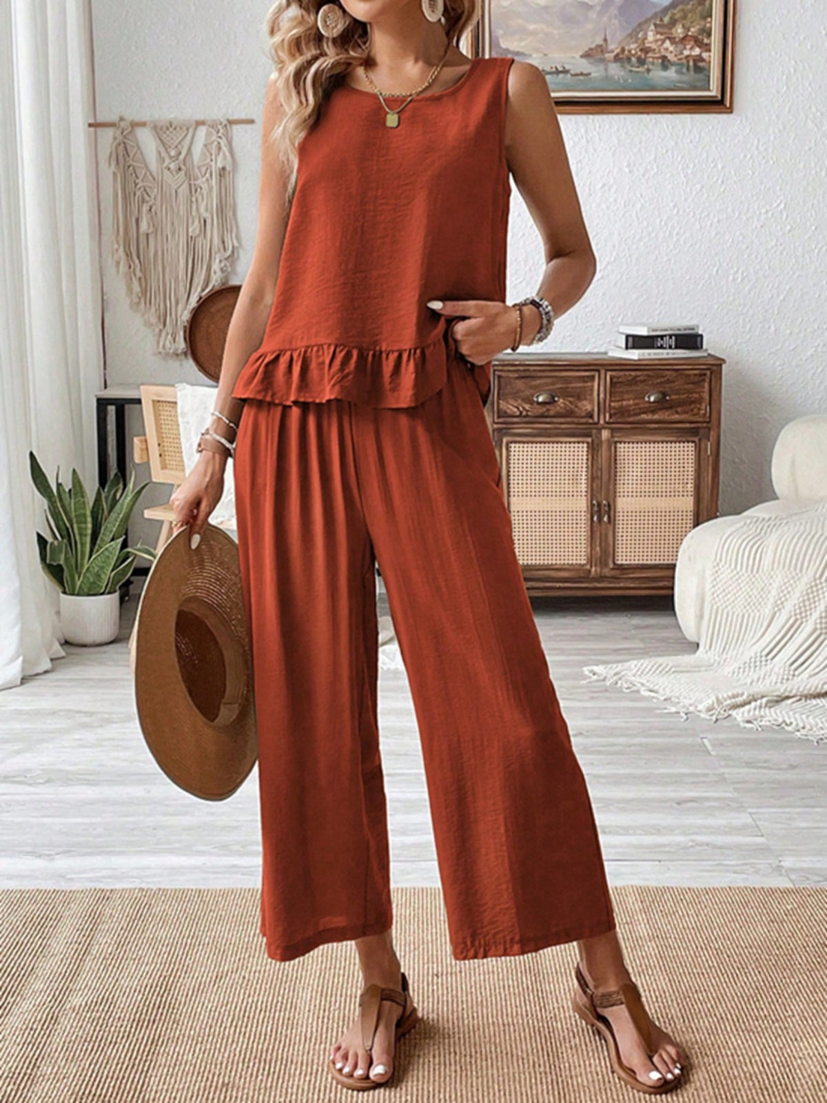 Terracotta matching ruffle tank and wide leg set detail
