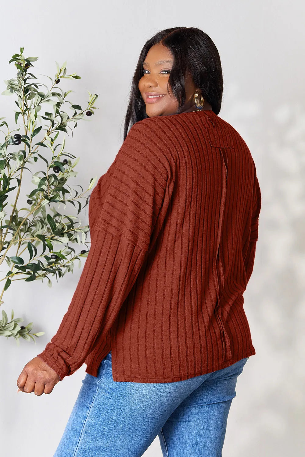 Ribbed slit knit top styled full length look