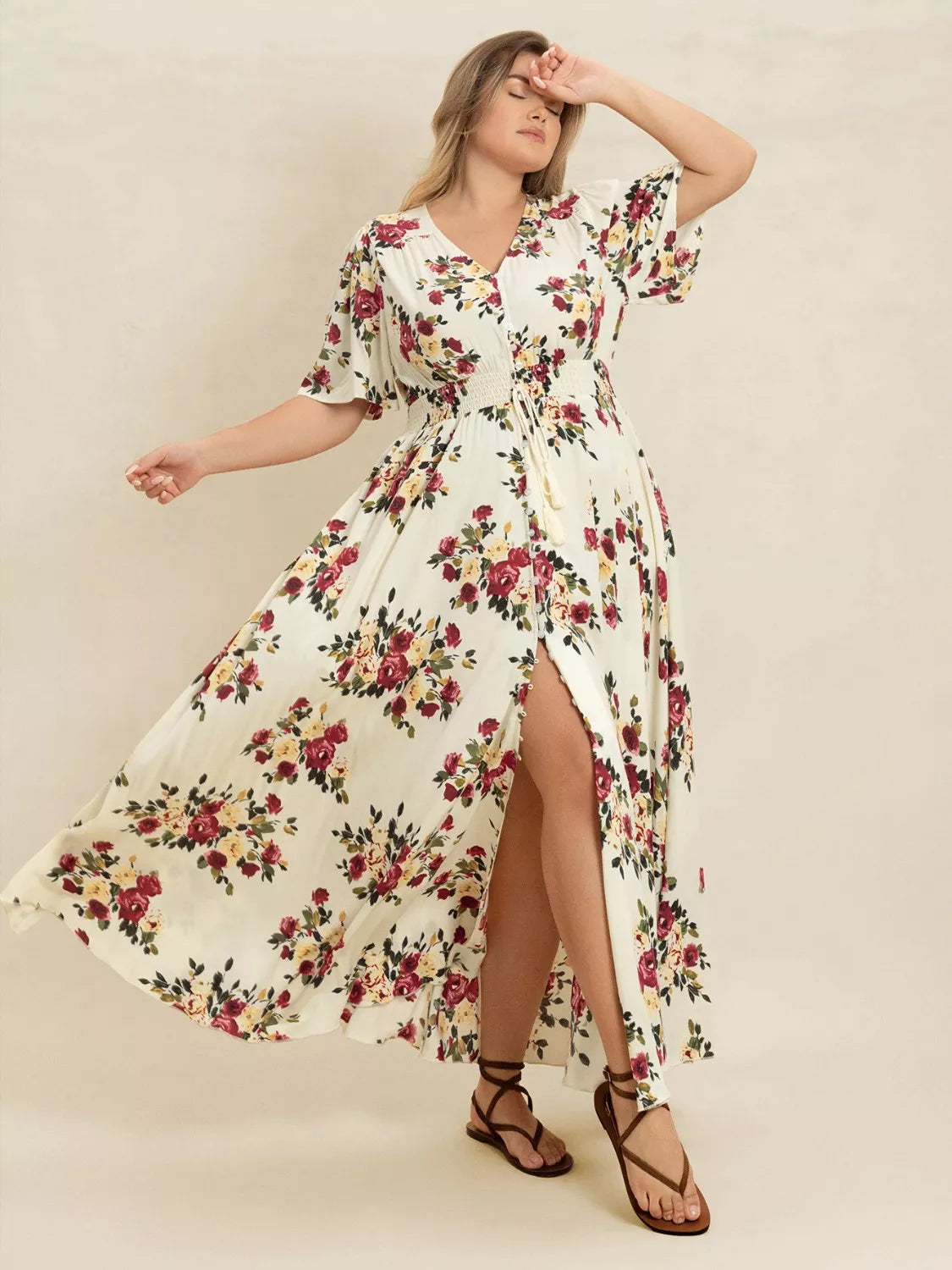 Pastel yellow floral flutter sleeve button front maxi dress movement shot