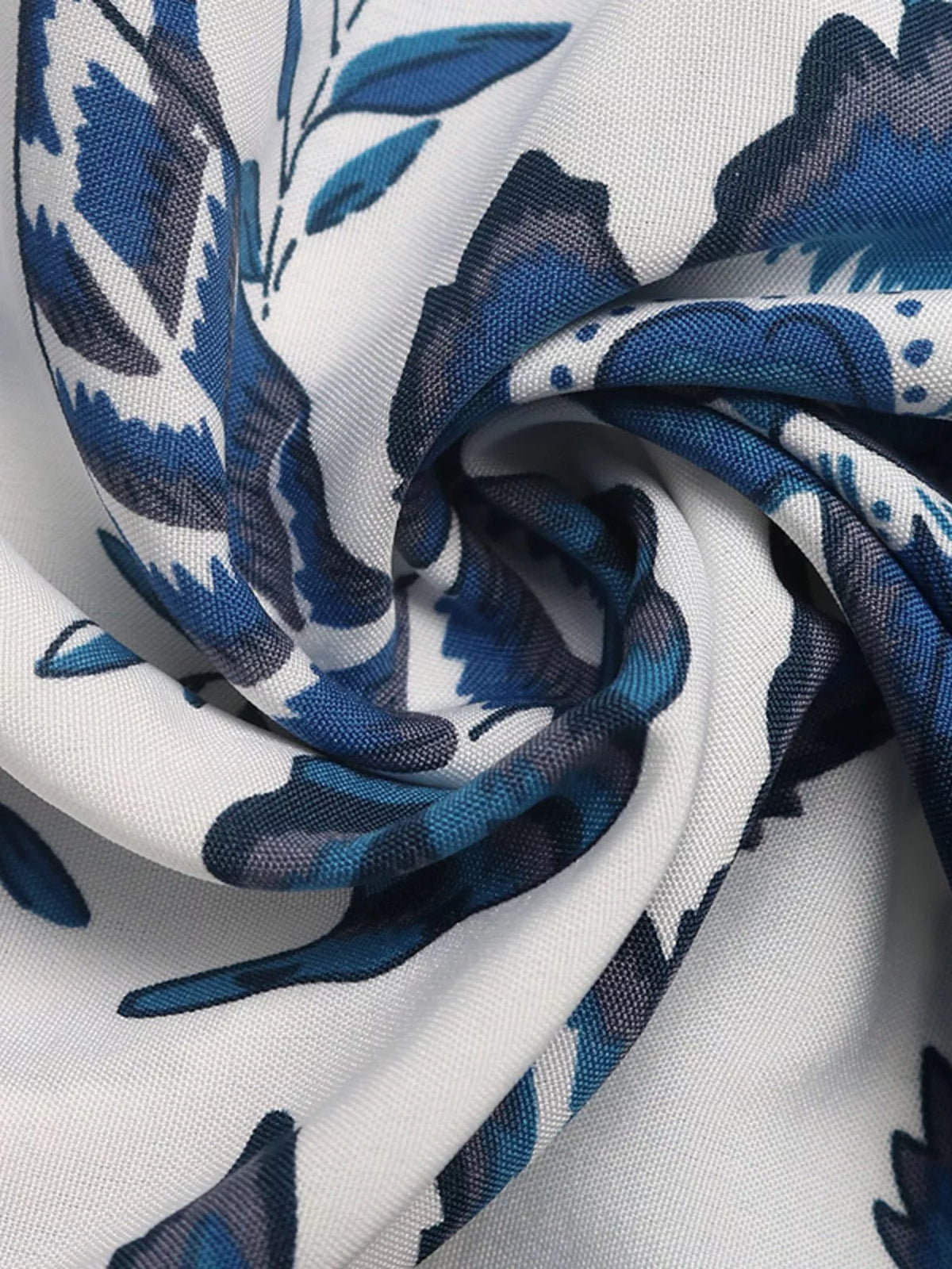 Blue floral strapless maxi dress hem detail