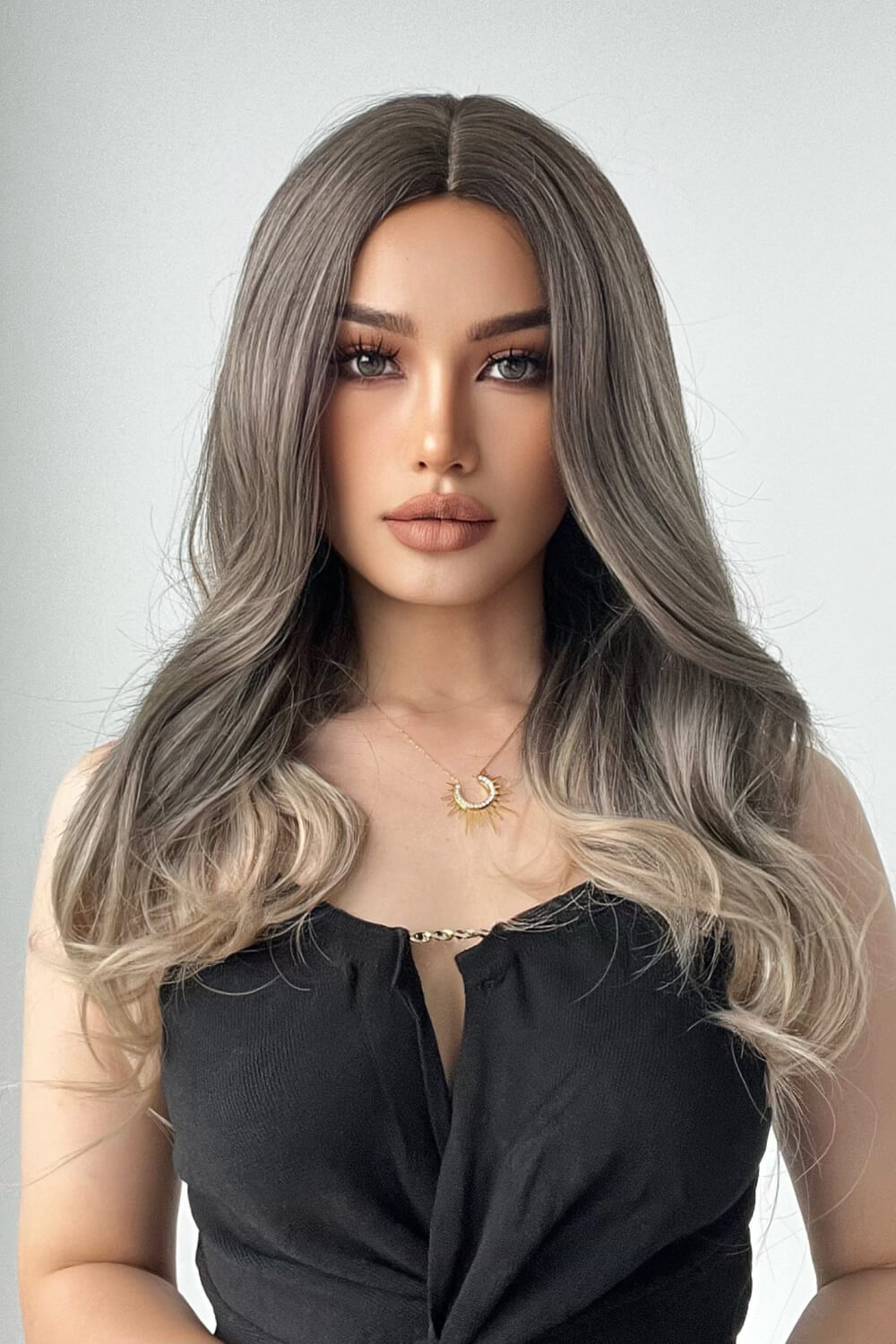 Model wearing long straight ombre wig