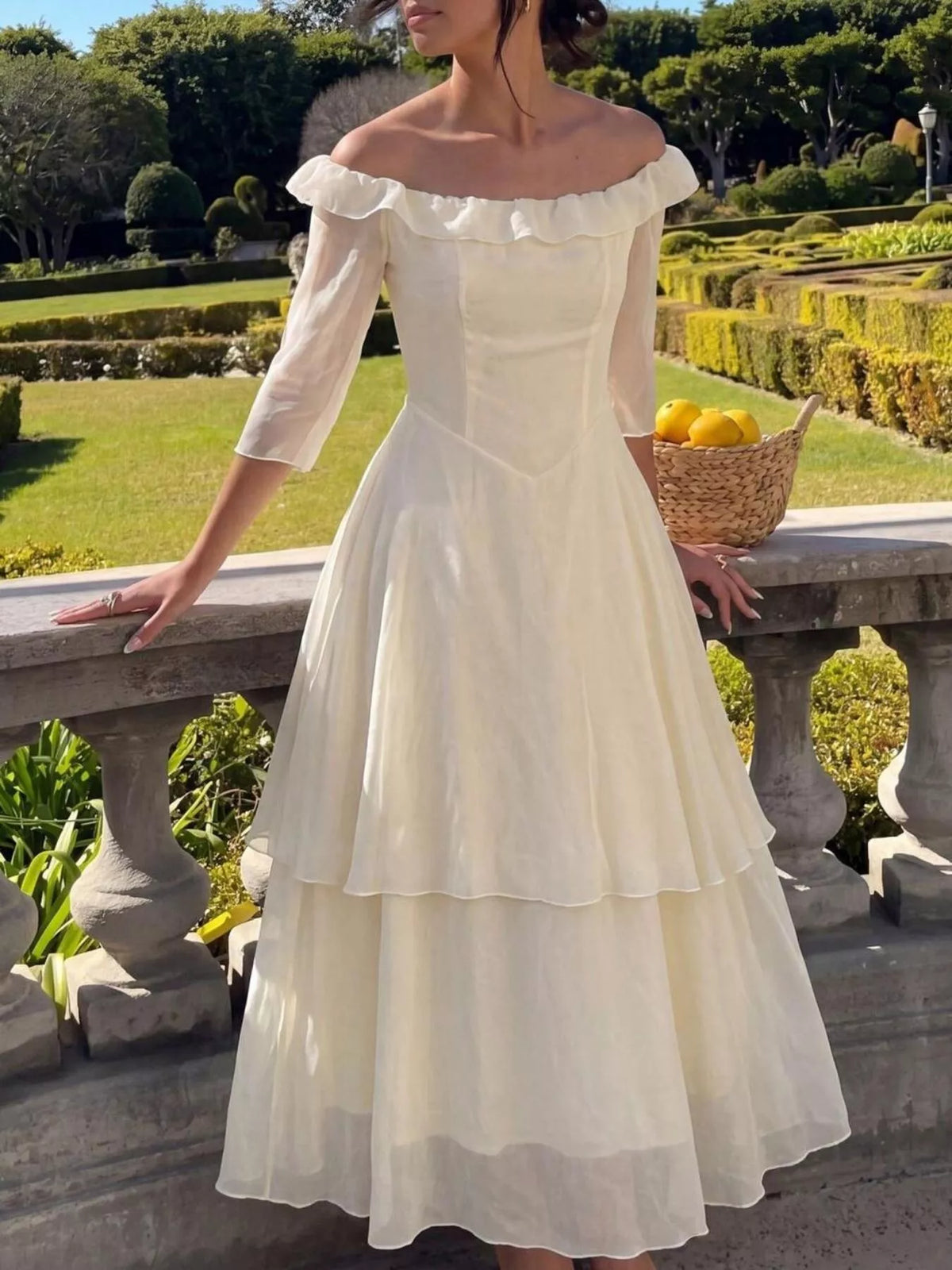 Cream layered ruffle midi dress side view