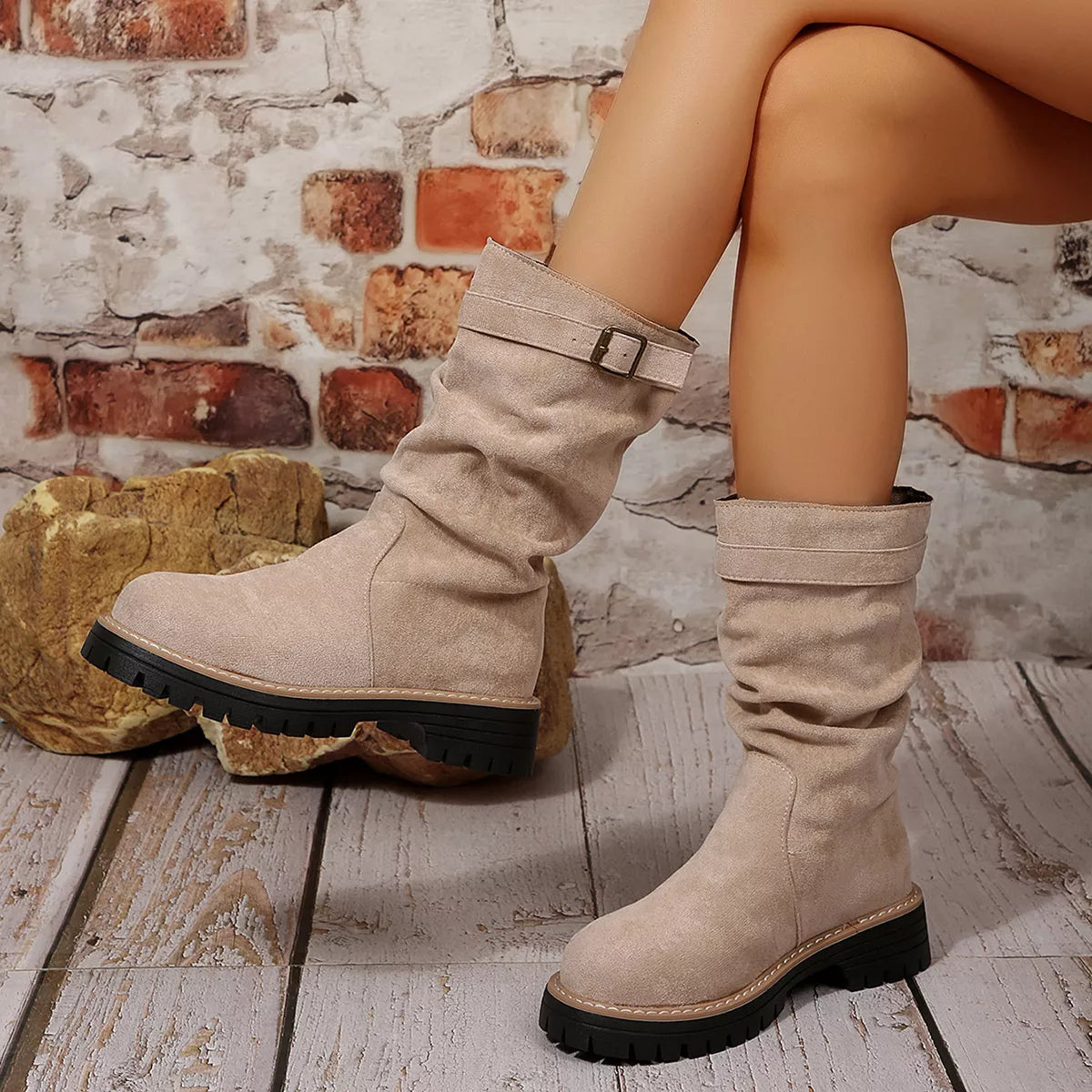 Buckle accent slouch boots sole view