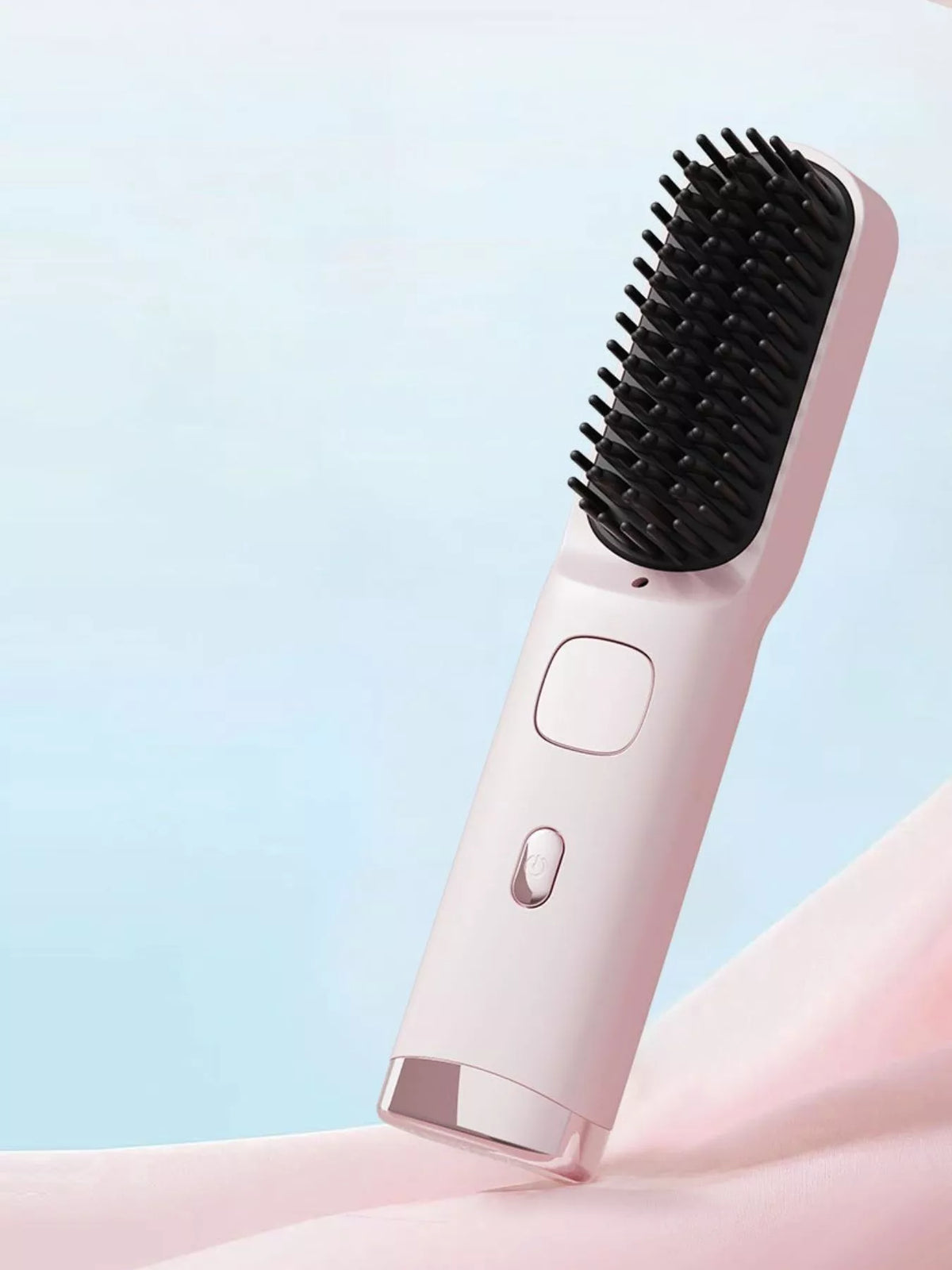 Straightening comb heated bristles close up