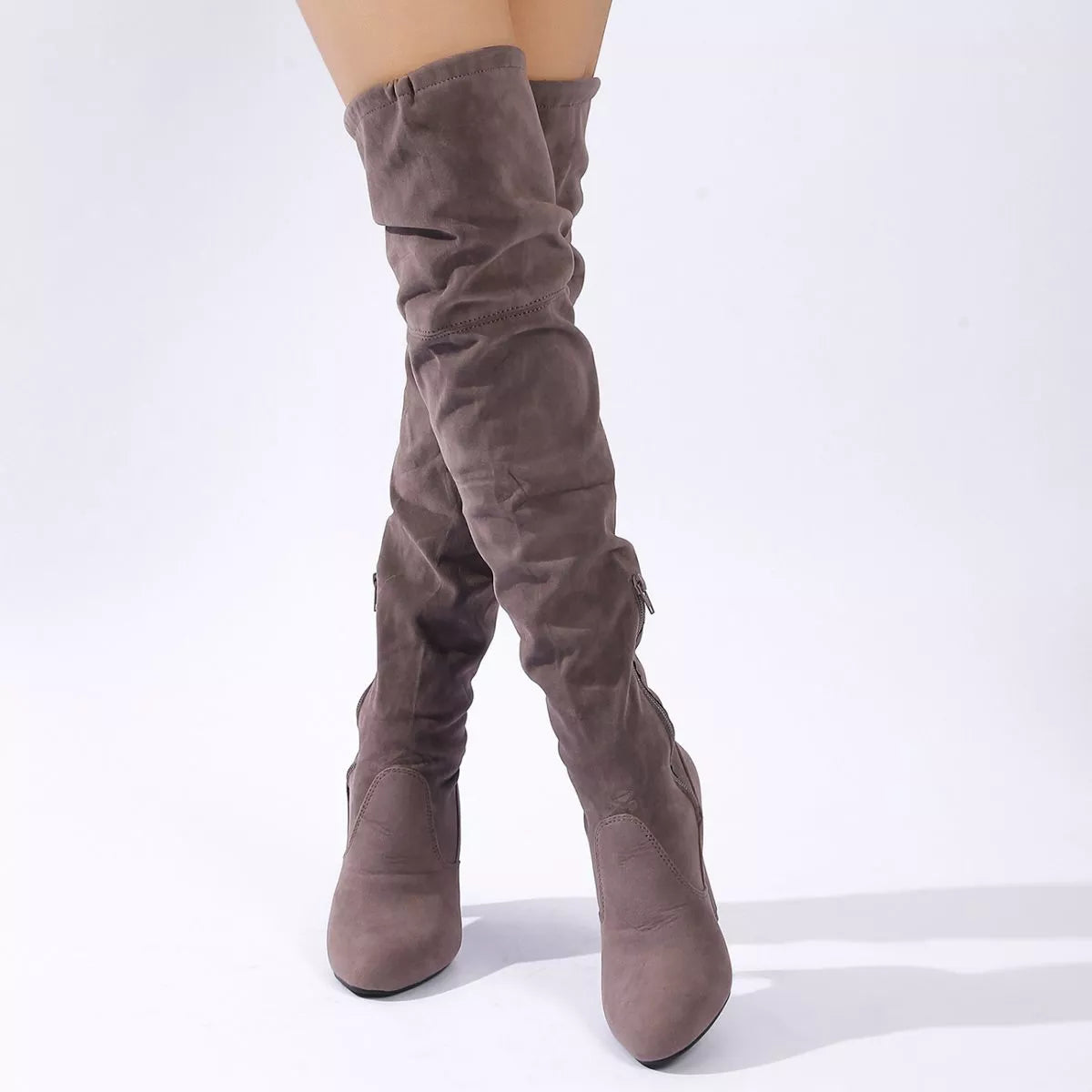 Over the knee high heel suede boots angled view
