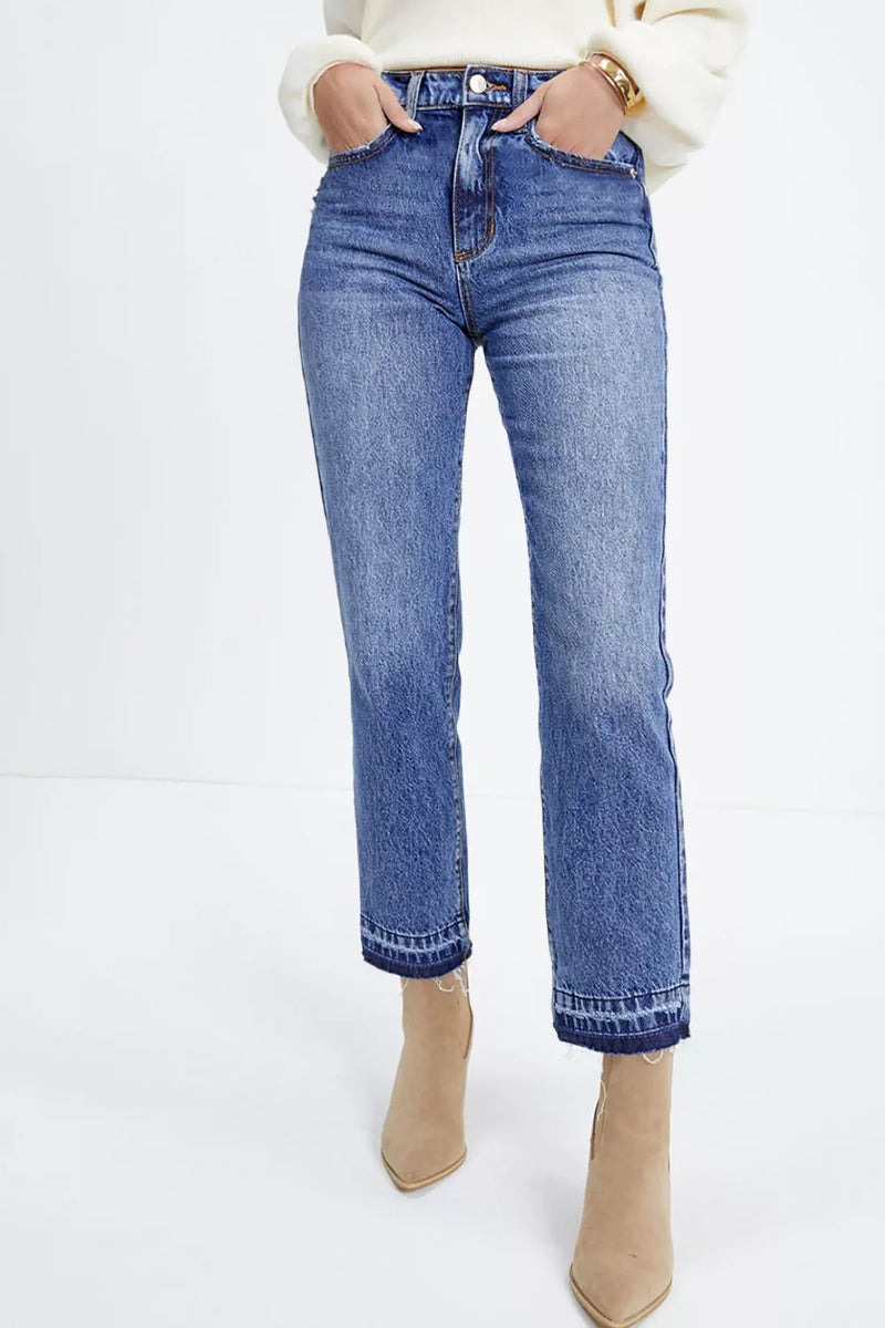 Whiskered wash cropped jeans in dusty blue front view