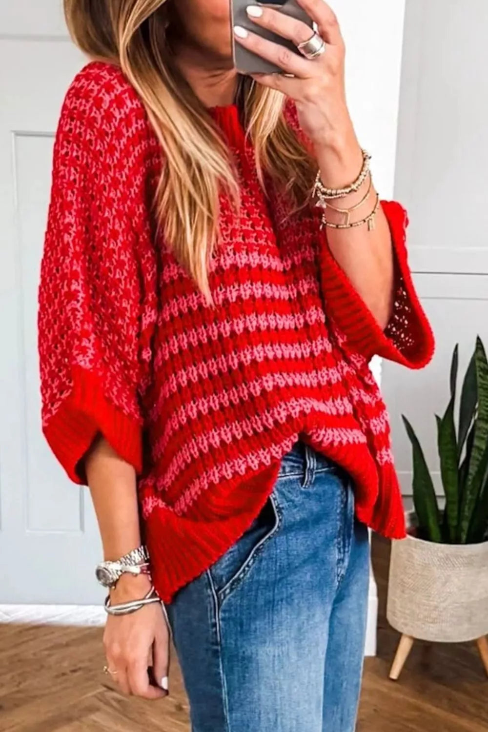 Striped crochet sweater side styling view