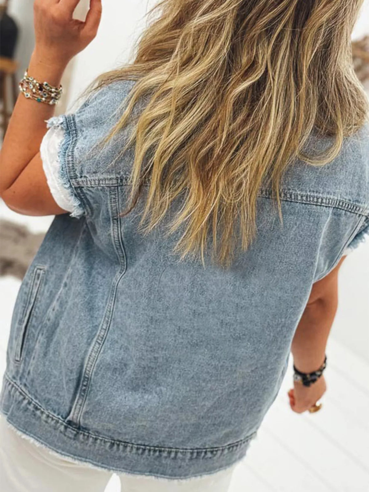 Flap Pocket Frayed Denim Vest in Medium Wash back view