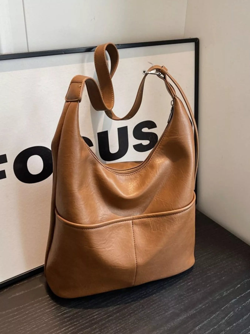 Adjustable strap PU leather shoulder bag front view