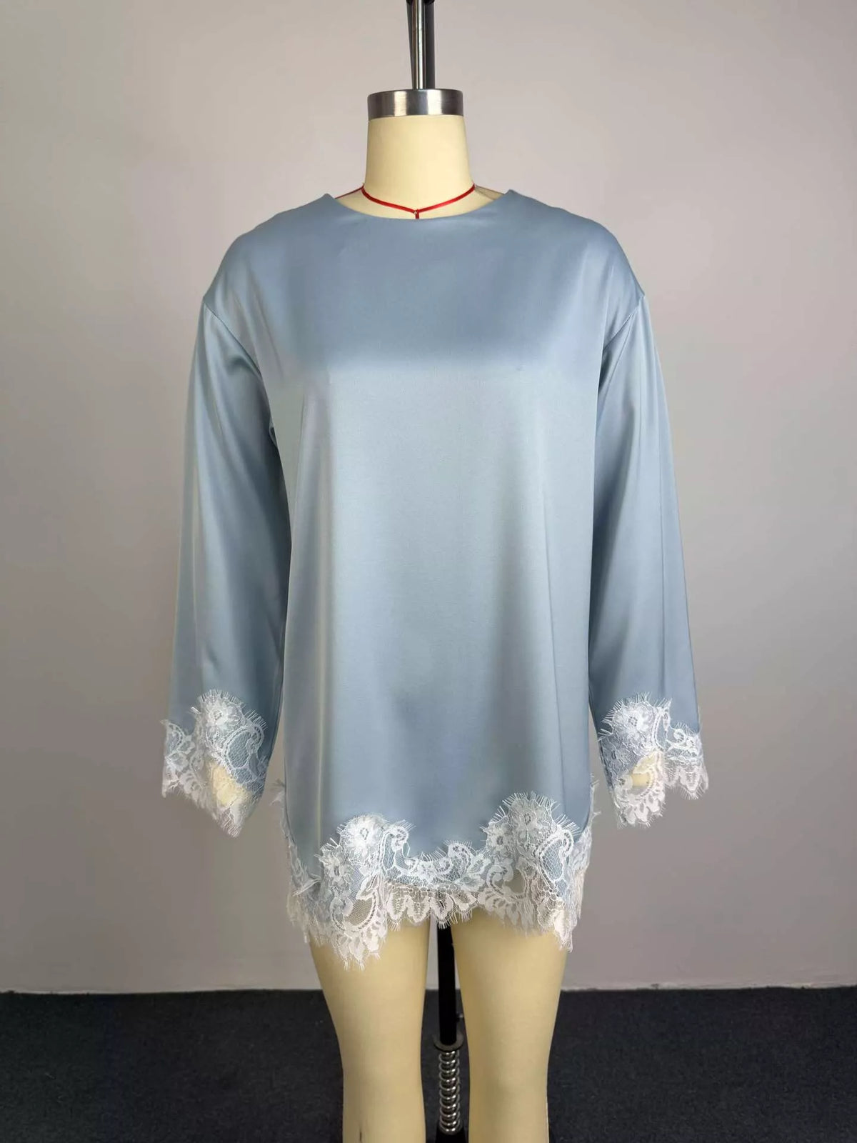 Satin top sleeve and cuff detail