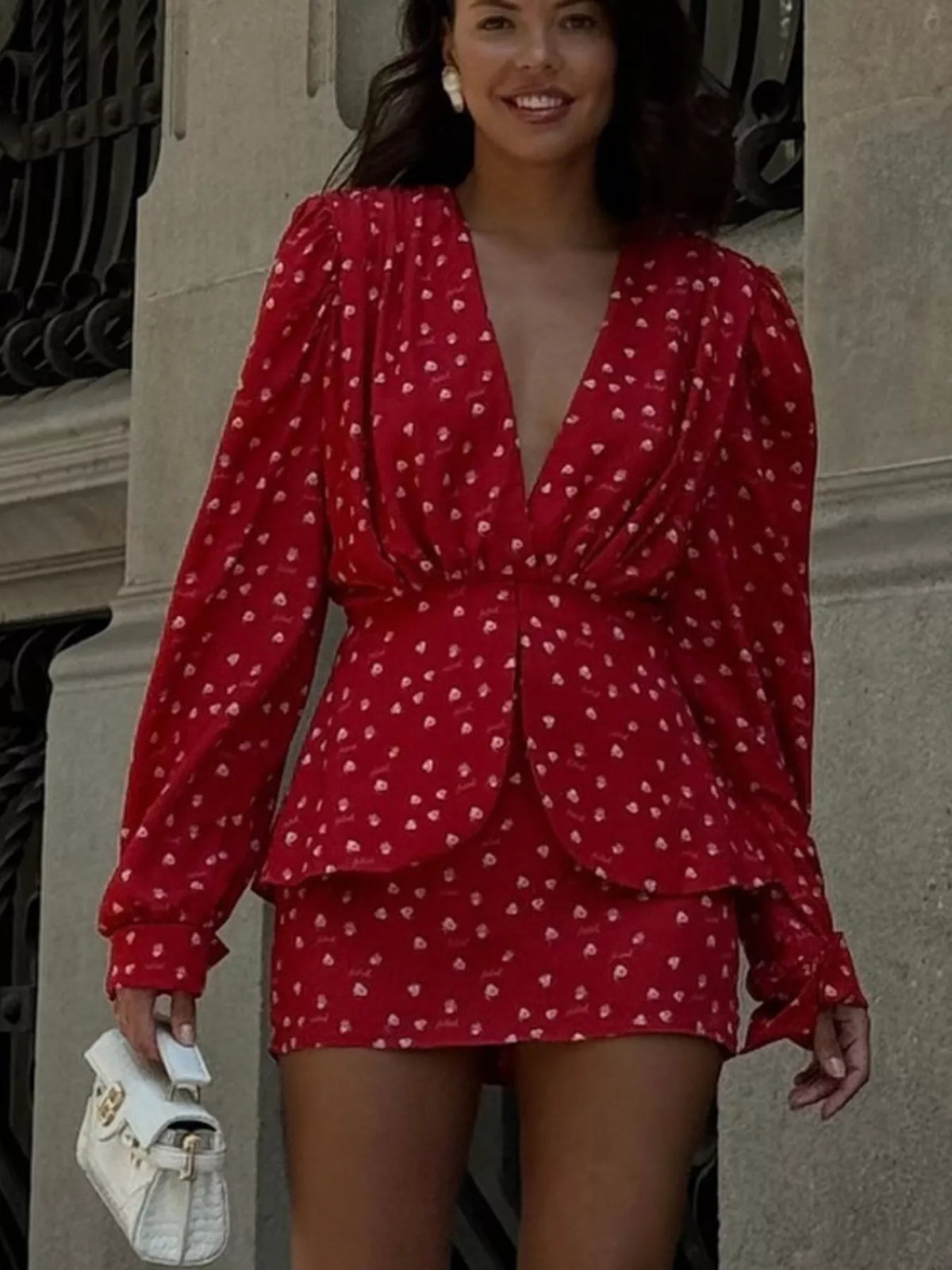Tiered skirt detail on the scarlet polka dot dress
