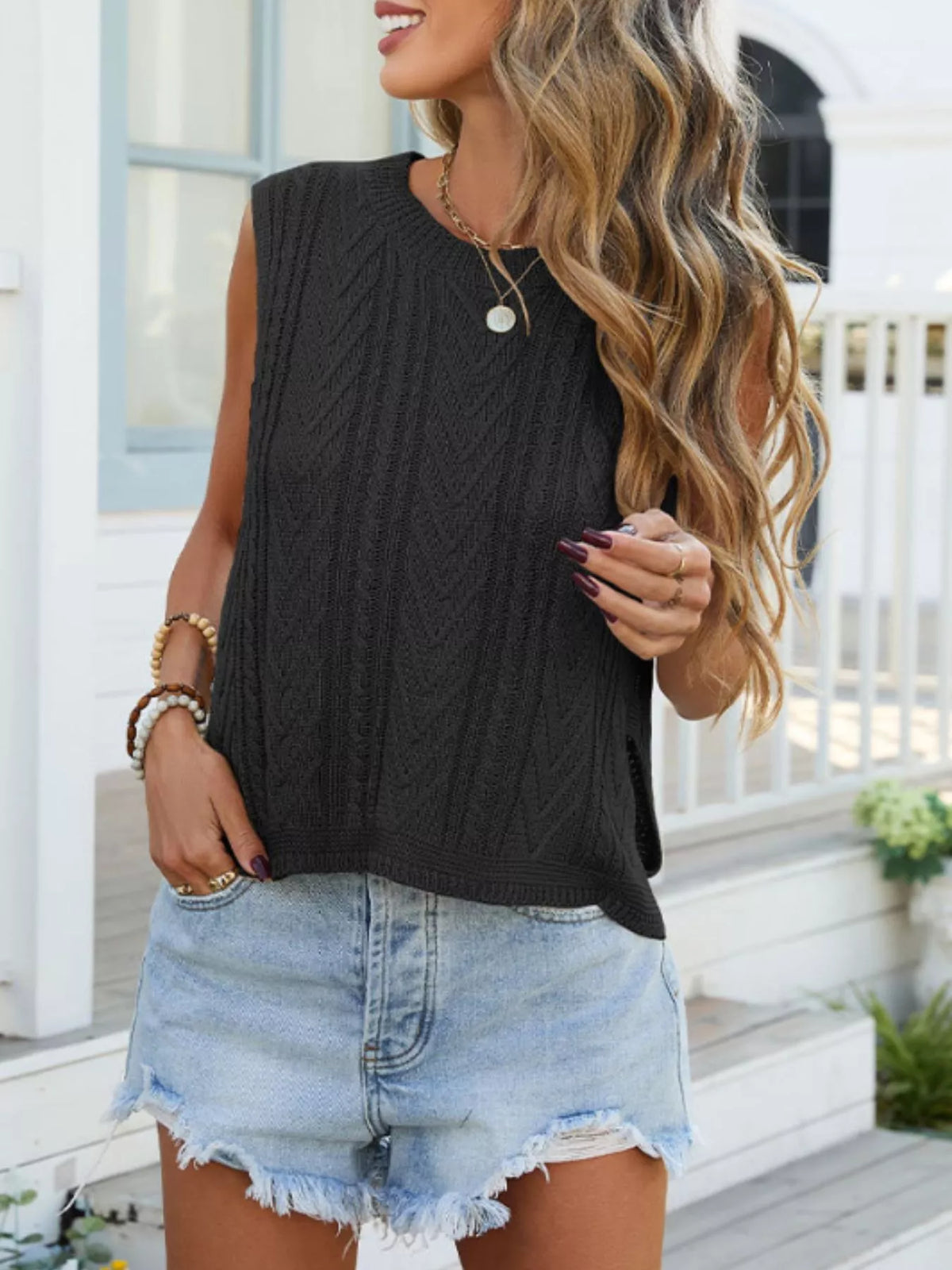 Cable knit round neck sweater vest side profile styling