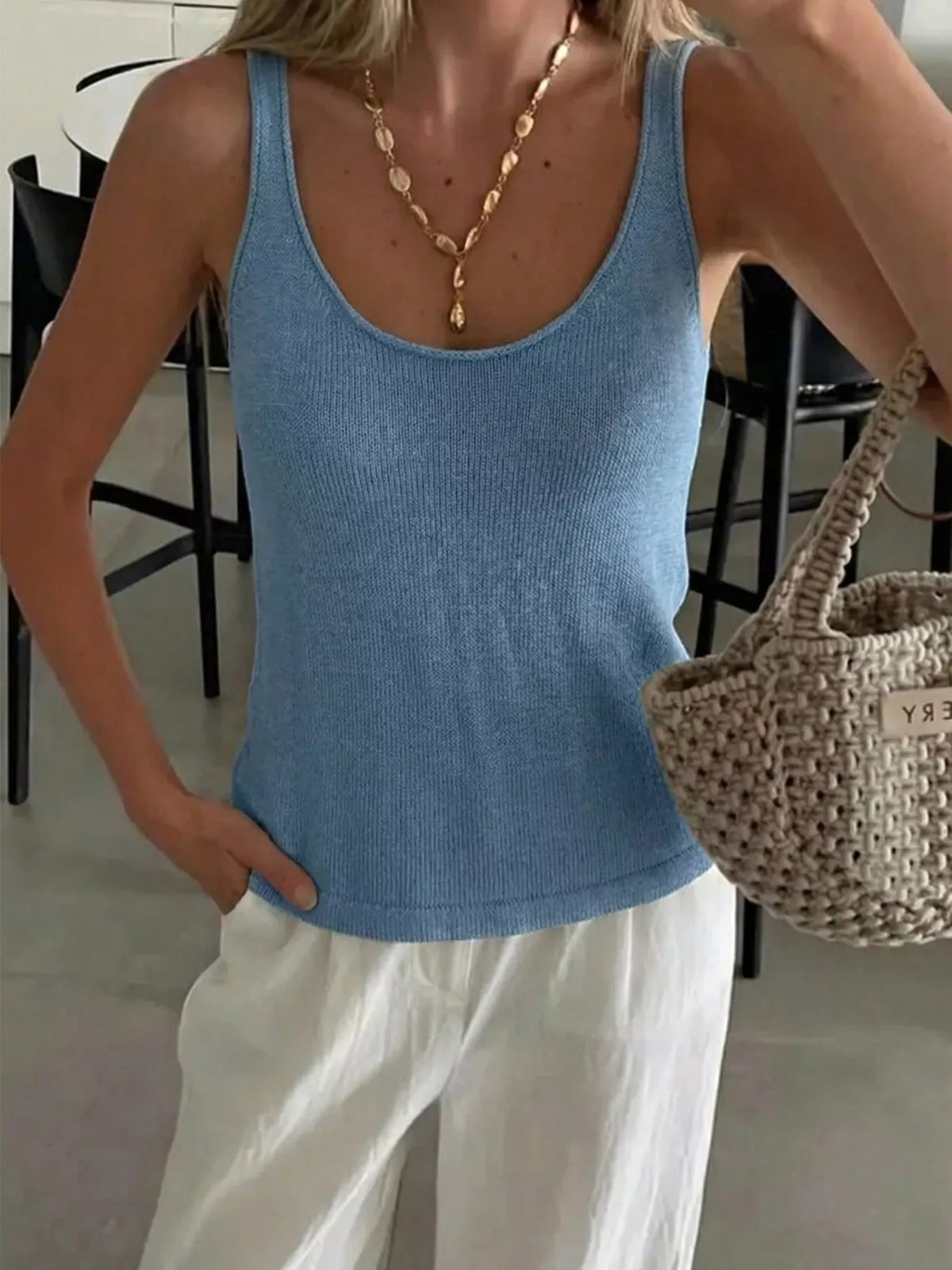 Blue scoop neck tank top side styling view