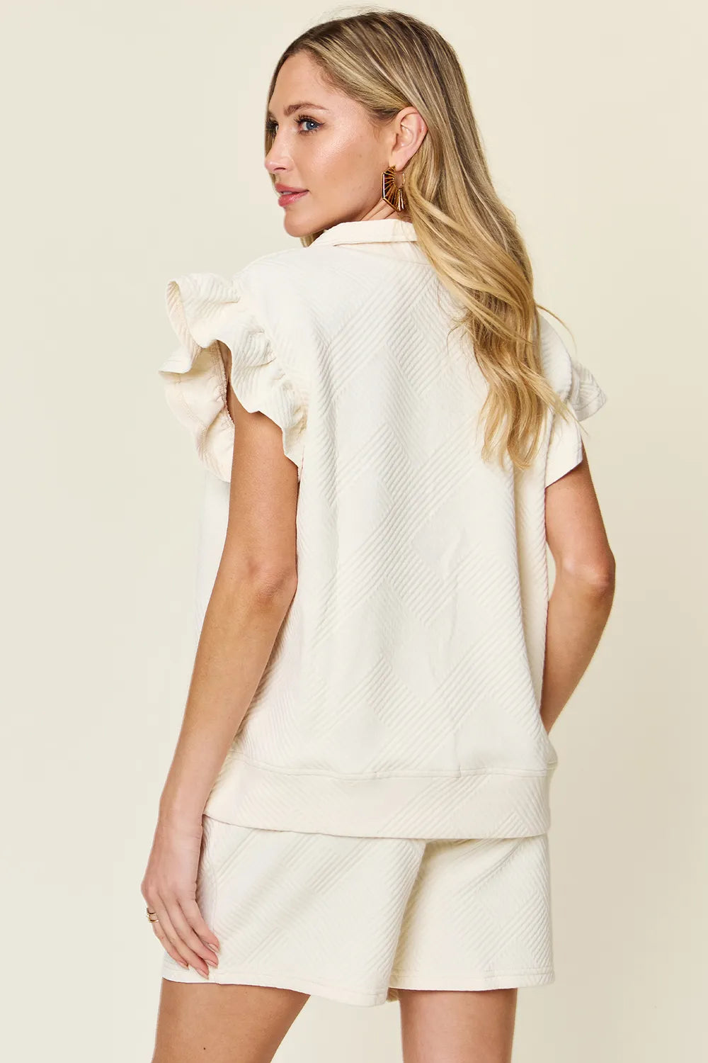 Flounce sleeve top and shorts set in black