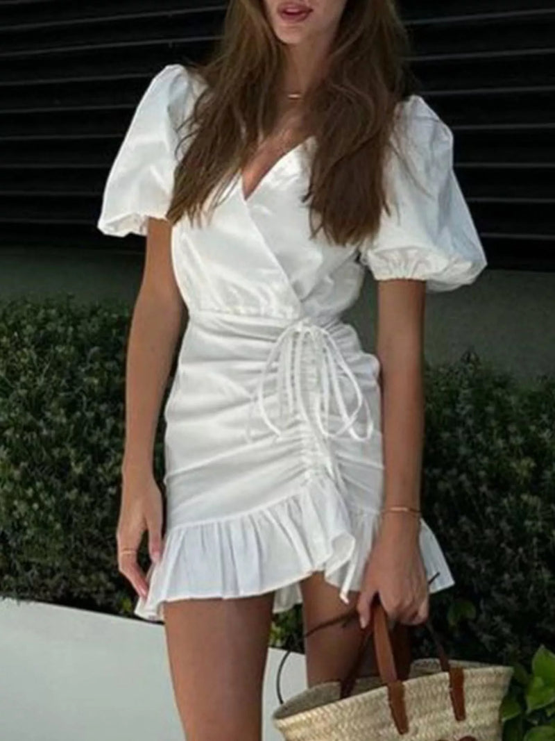 White ruffled hem ruched puff sleeve mini dress front view