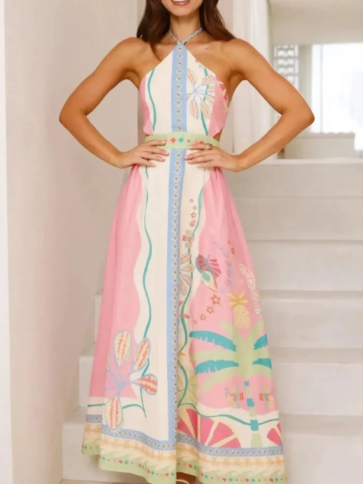 Printed maxi dress side view showing drape