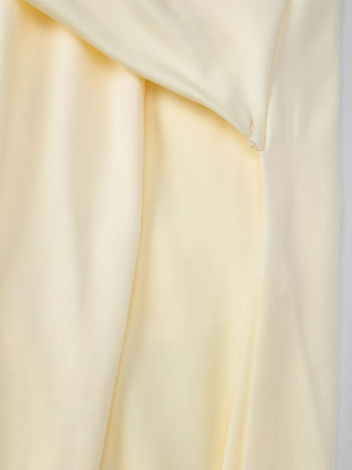 Full styling view of the womens halter neck split dress