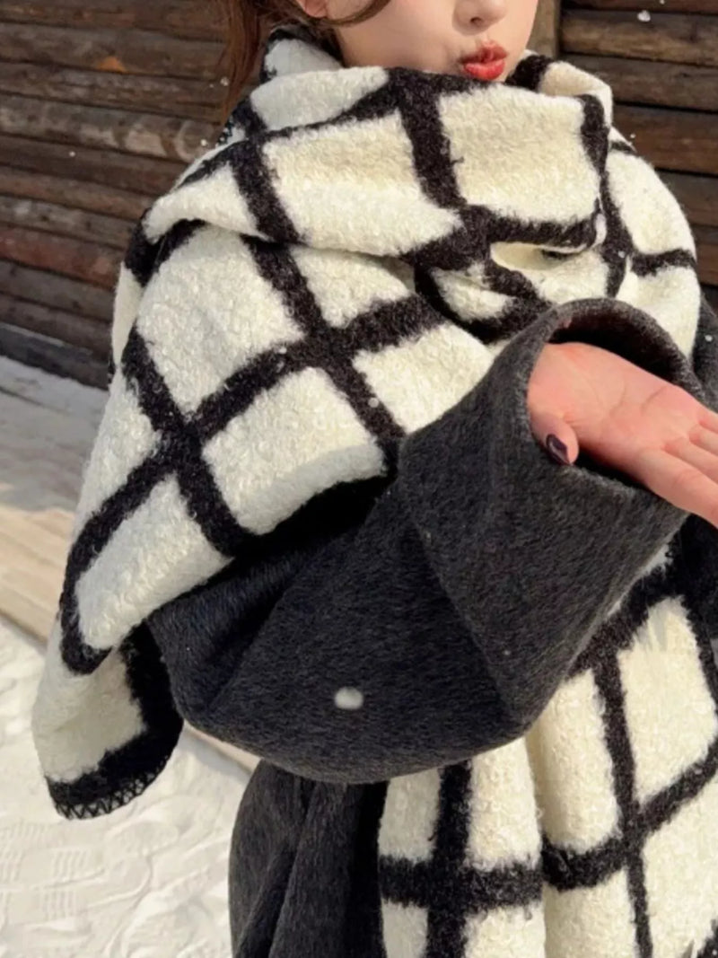 Plaid pattern winter scarf shown around the neck