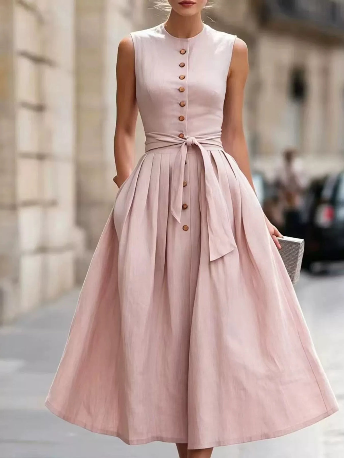 Side view of the sleeveless midi dress