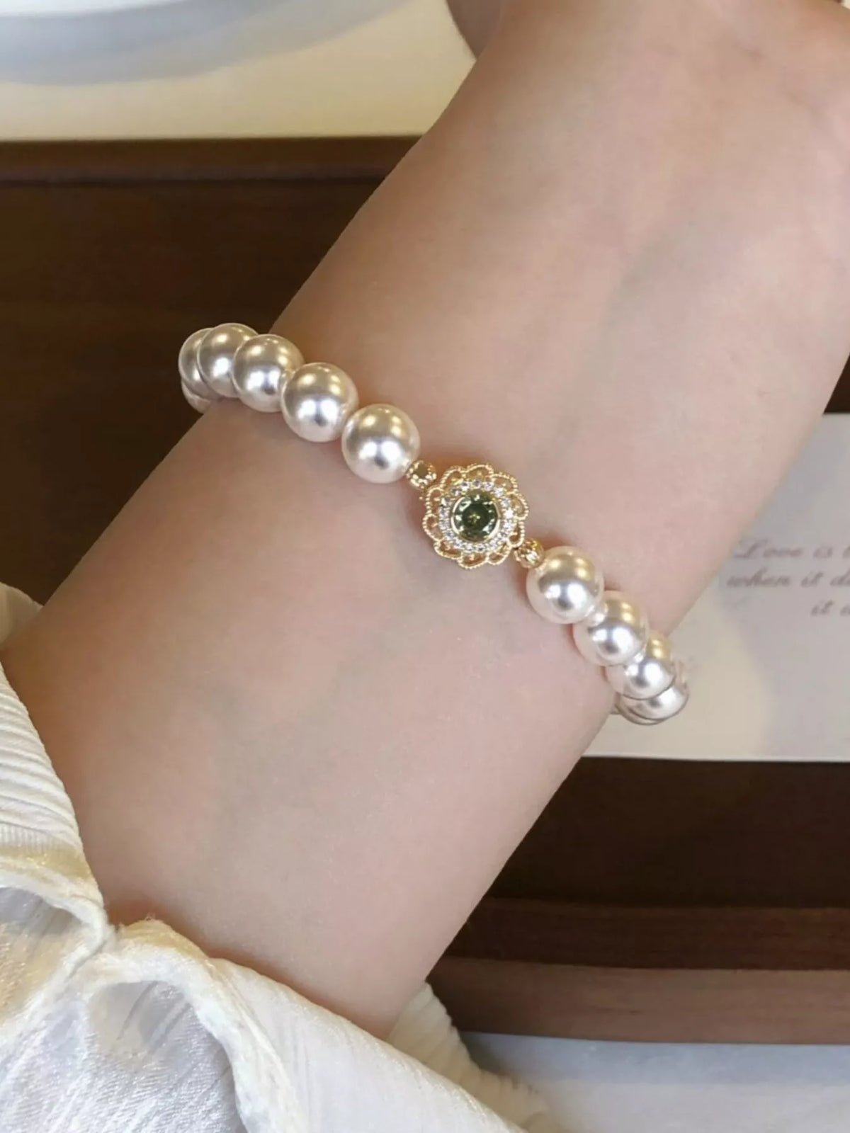 gold pearl flower bracelet angle view
