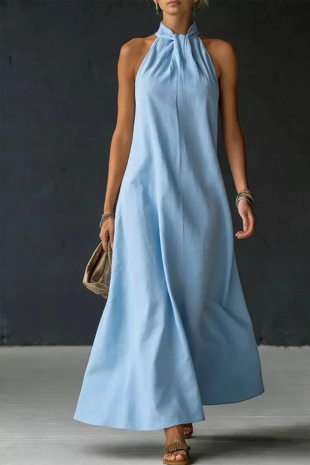 Halter neck sleeveless maxi dress with side slit front view