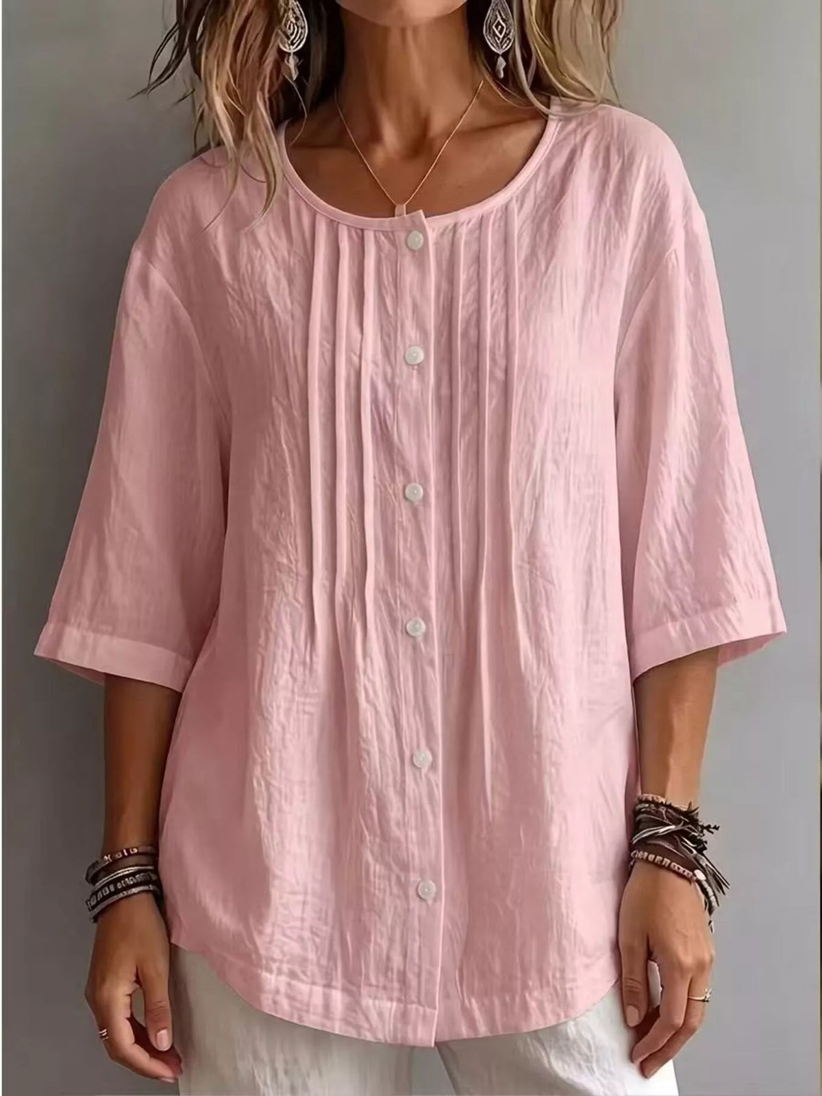 Textured blouse sleeve detail close up