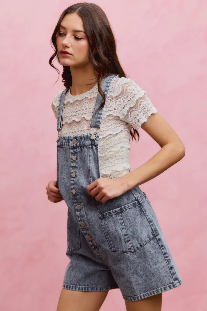 Denim romper front pocket detail