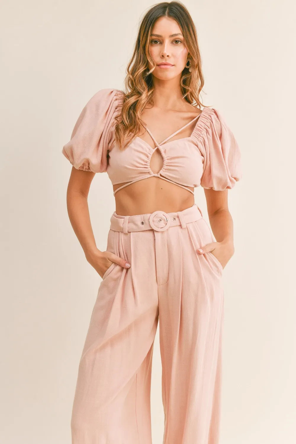 Cutout detail of dusty pink pants set
