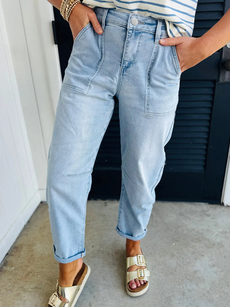 High rise barrel jeans in blue wash front view