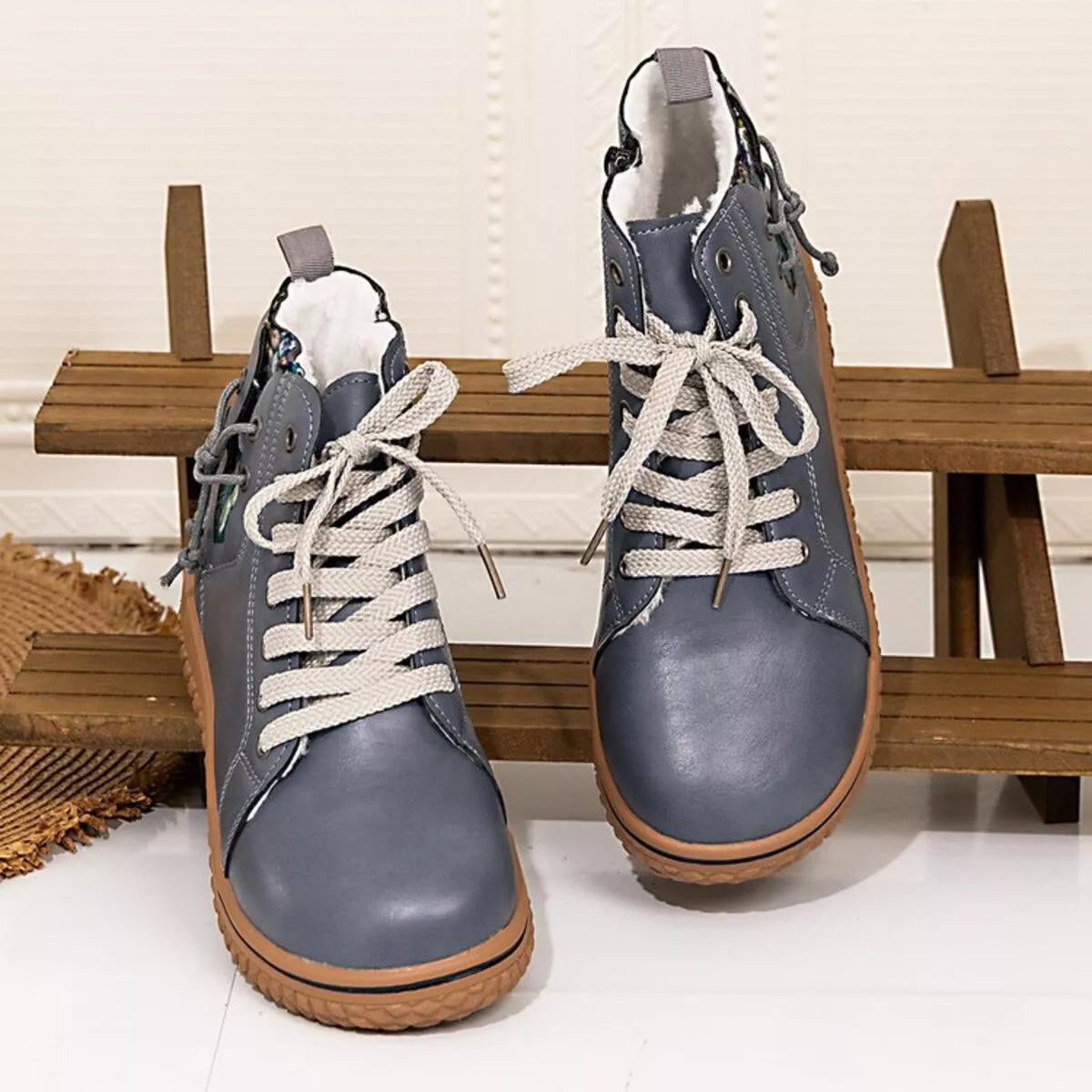 Round toe platform ankle boots angled pair
