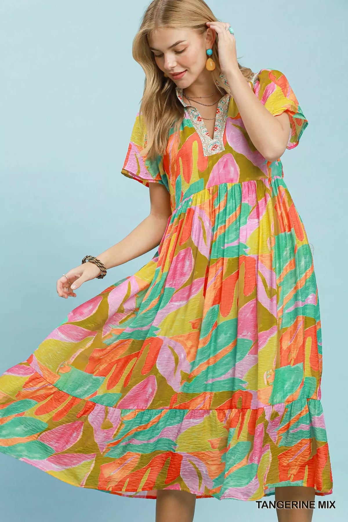 Tangerine tropical print tiered midi dress front view