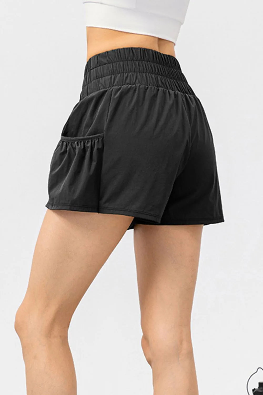 Elastic waist pocketed active shorts full length view
