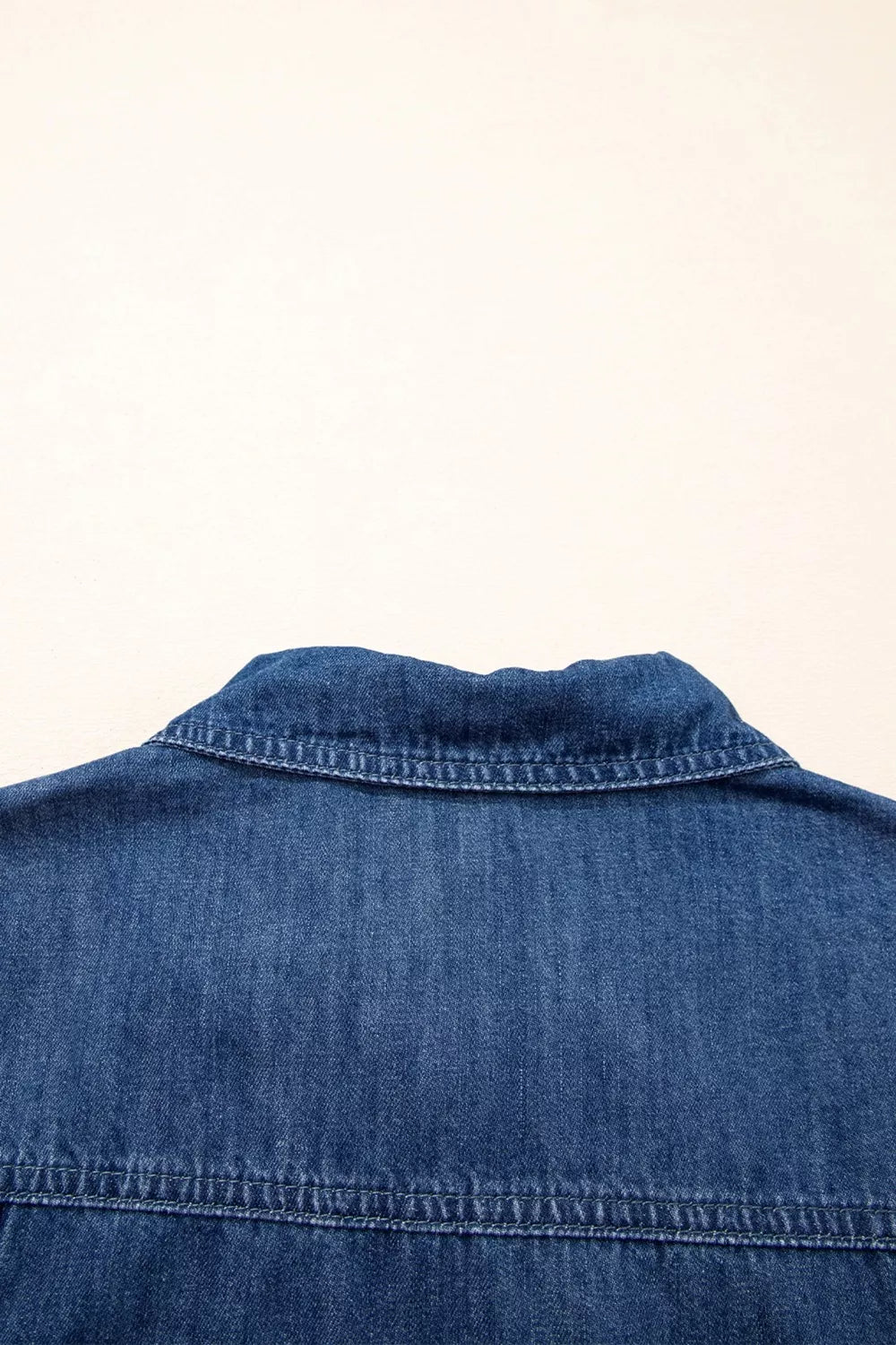 Dark blue zip up collared denim mini dress full length view