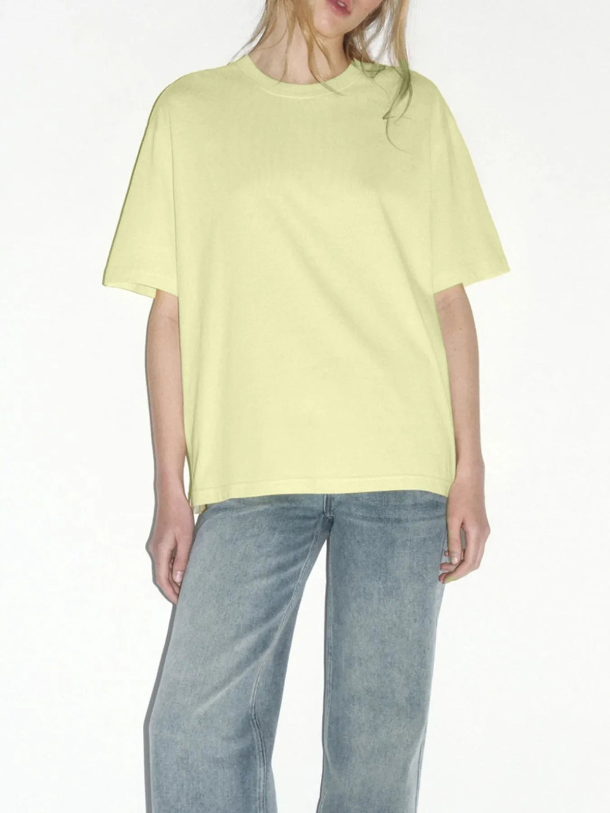 side view showing roomy plus size fit of the tee