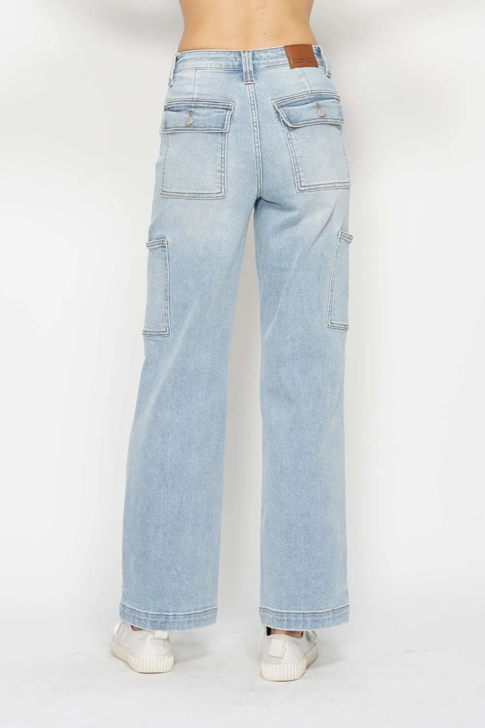 Straight leg cargo jeans shown from the side with pocket detail