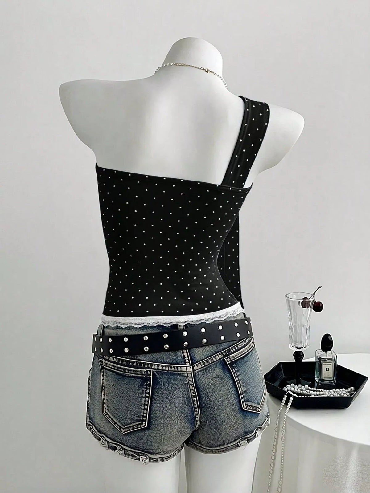 Polka dot cami shown in a navy colorway