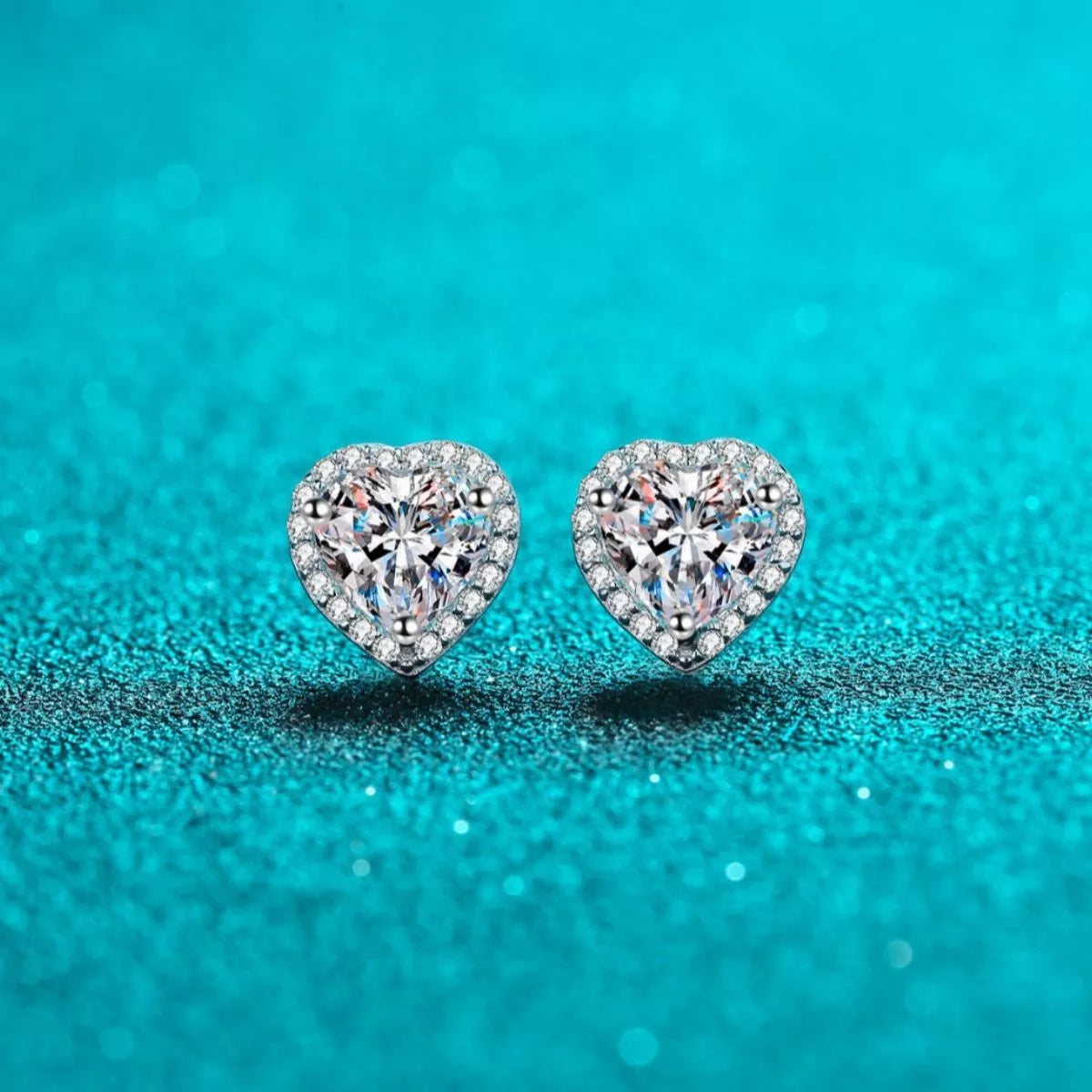 Heart shaped moissanite sterling silver stud earrings front view