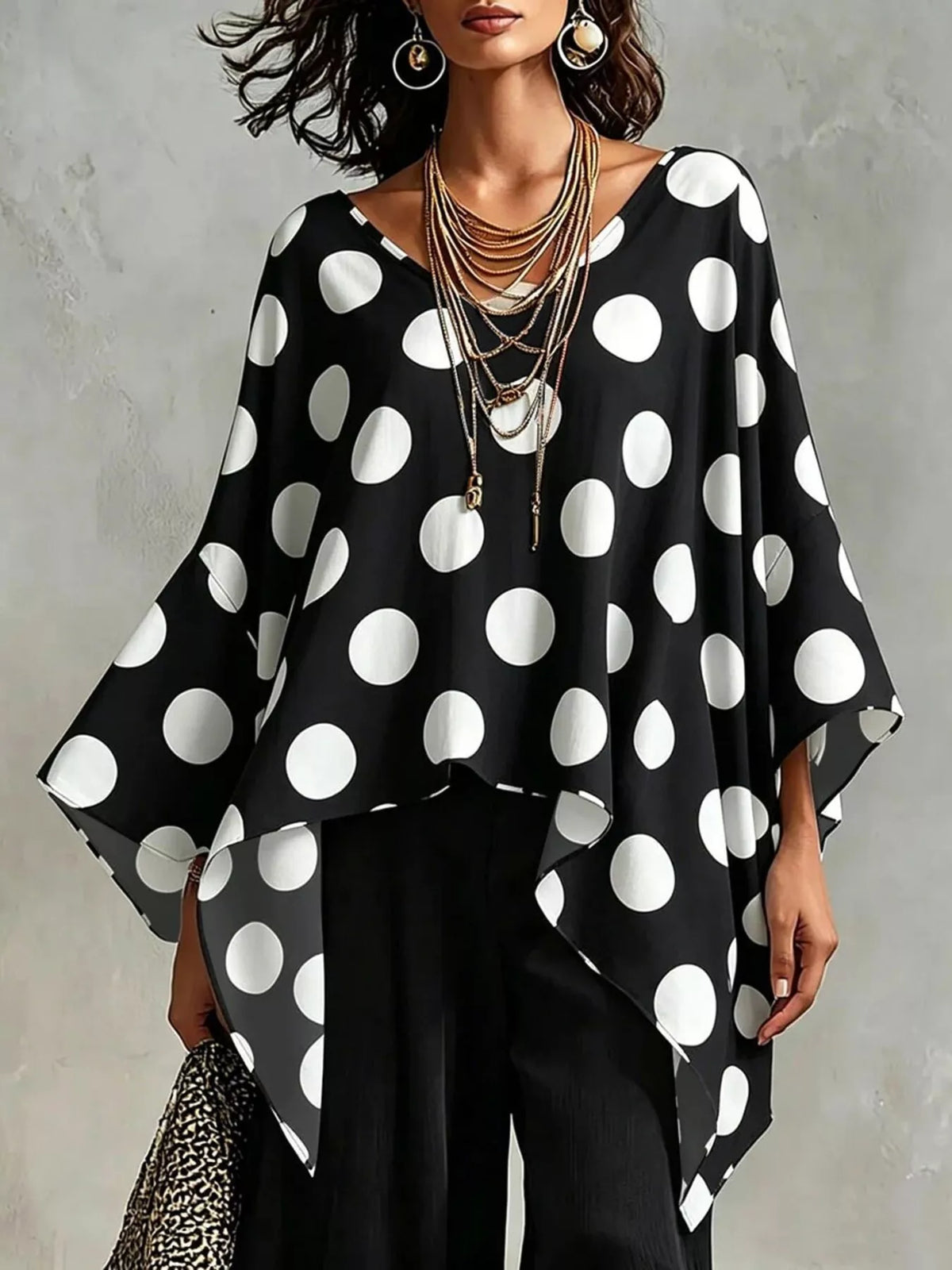Back view of the polka dot asymmetrical top