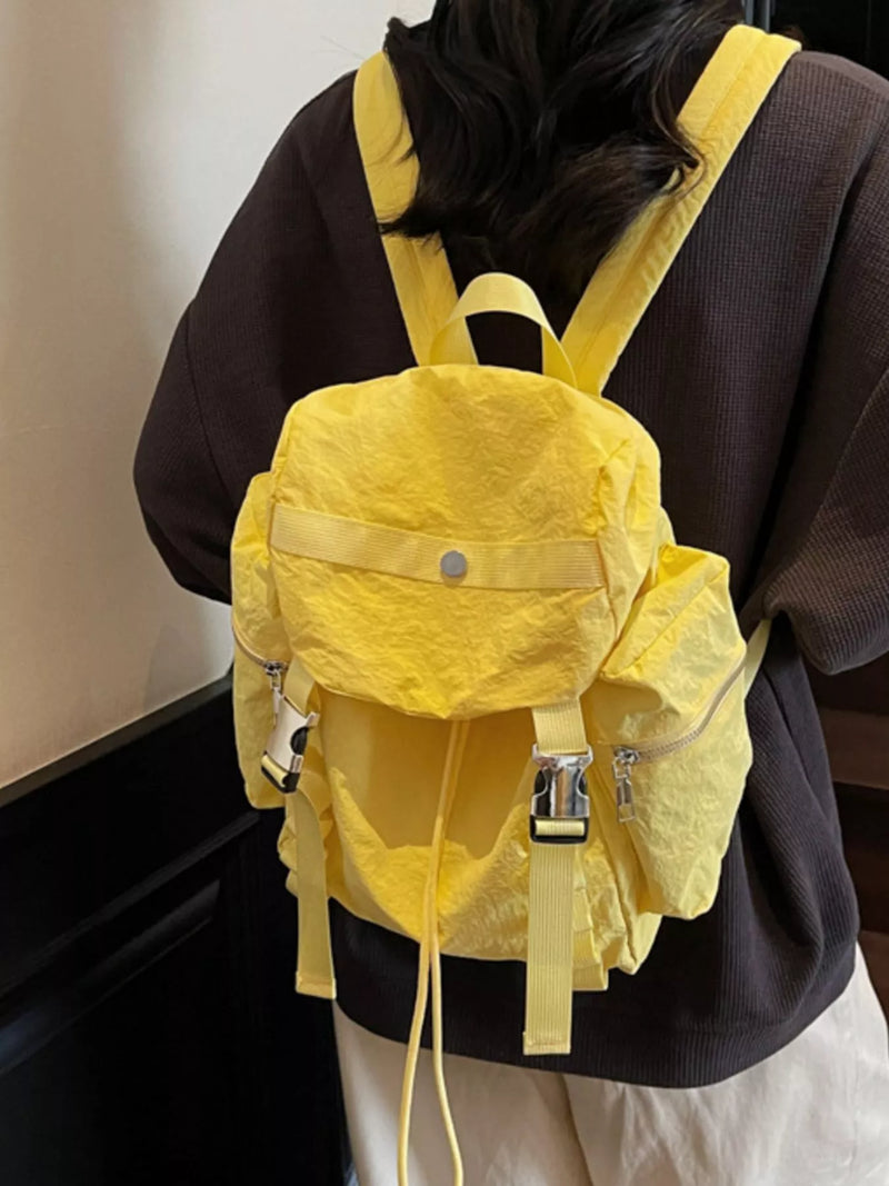 Drawstring casual nylon backpack in yellow front view