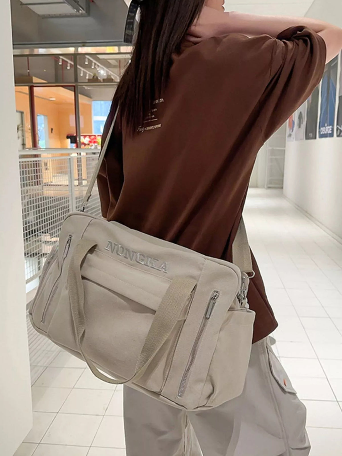 Canvas duffel side view showing side pocket