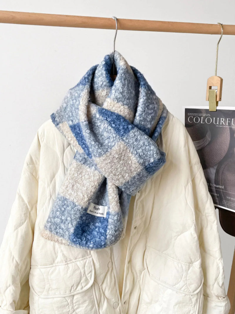 Cozy plaid knitted scarf shown at full length