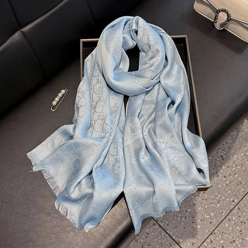 Raw hem warm scarf draped over the shoulders