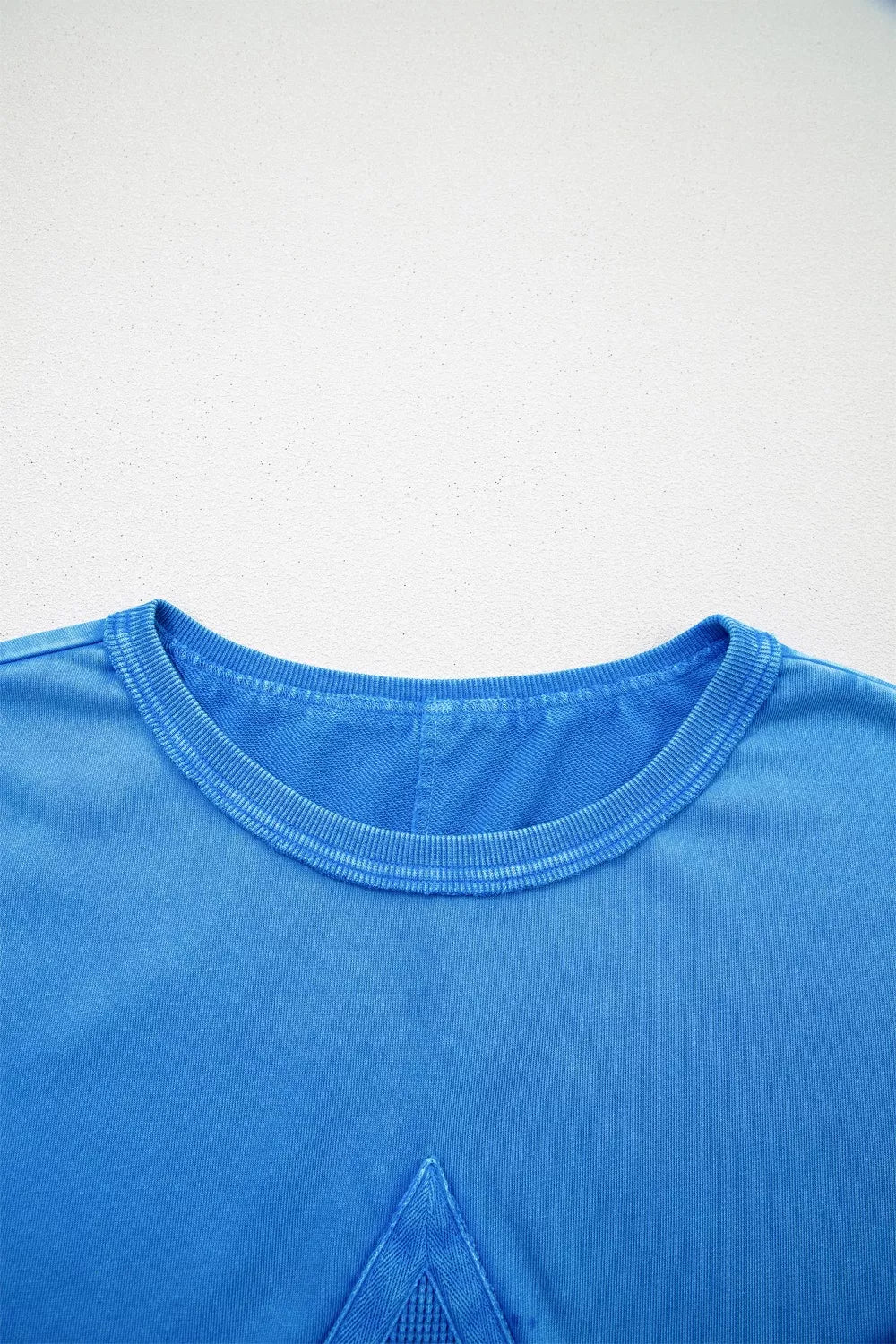Blue mineral wash star patchwork oversize tee styled look