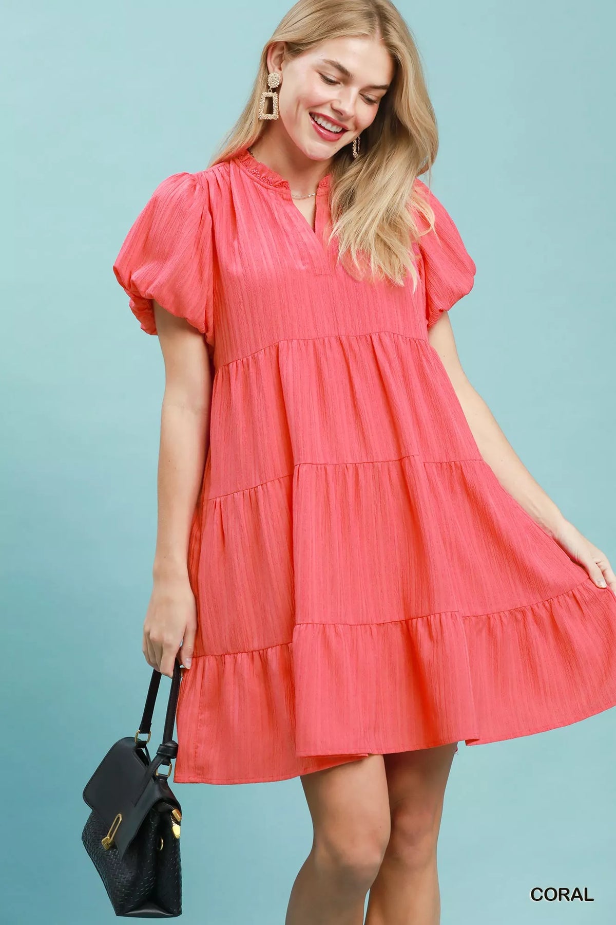 Coral puff sleeve tiered babydoll mini dress front view