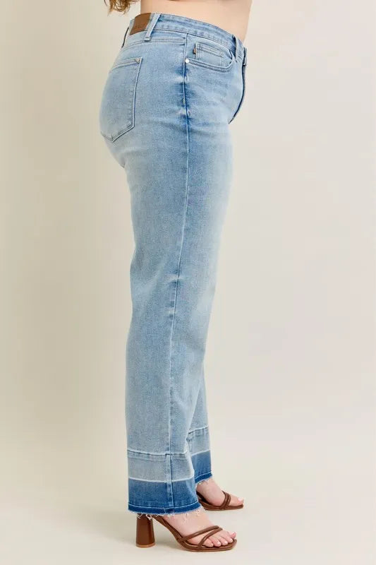 Contrast hem close up on wide leg jeans